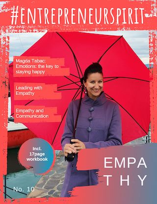 A smiling woman in a purple coat holds a red umbrella on a magazine cover titled "Empathy." Topics include emotion, empathy, and communication.